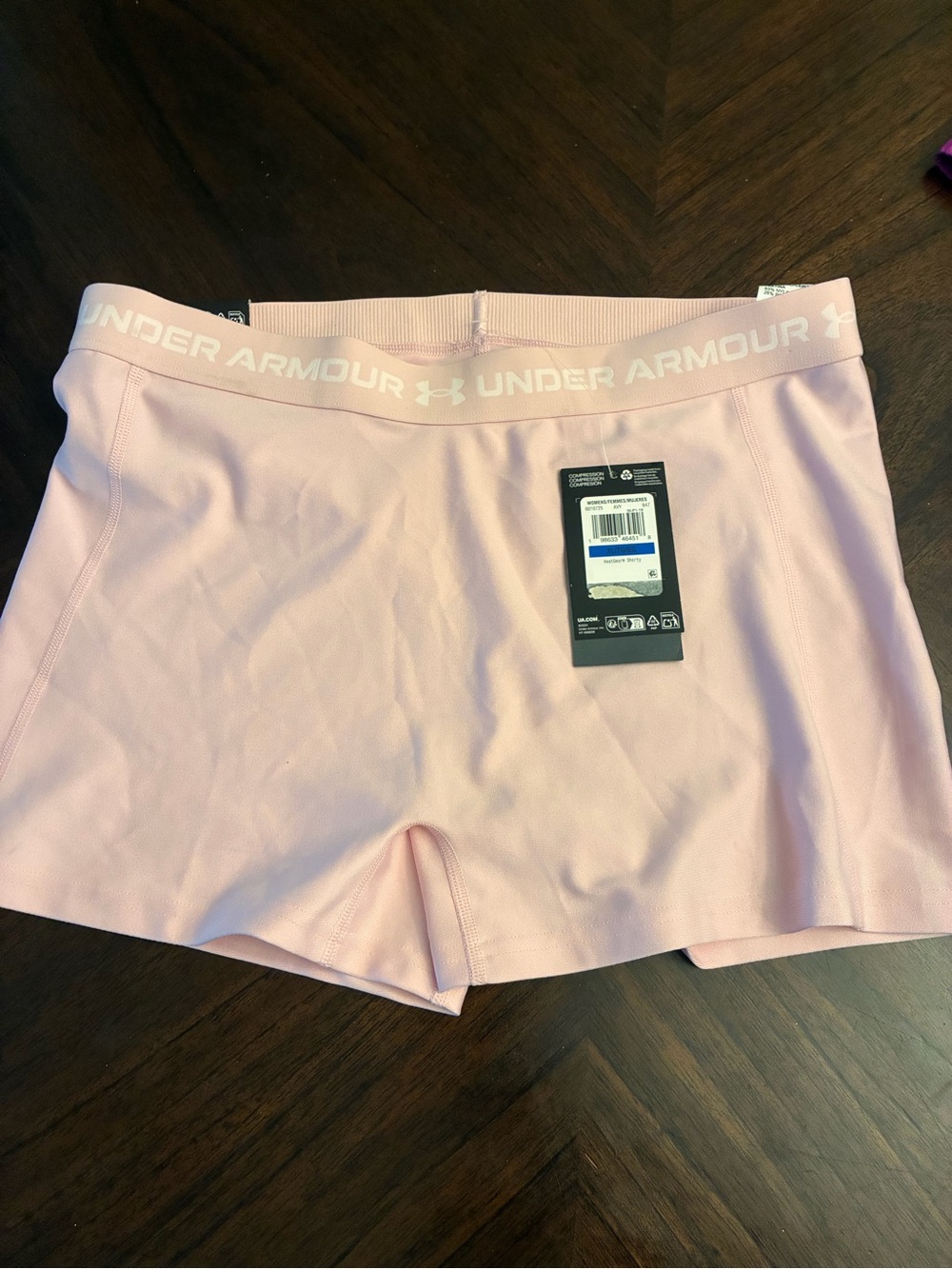 Under Armour women’s compression shorts 
Pink size XL new
